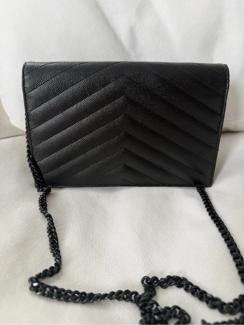 Saint Laurent Envelope Chain Wallet black monochrome design .